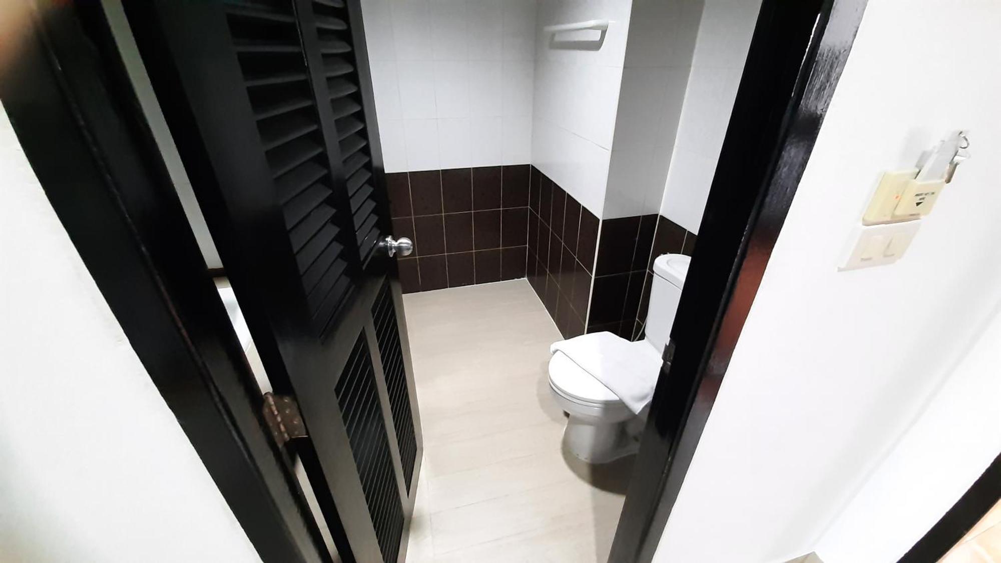 Отель Golden Tulip Essential Паттайя Номер фото